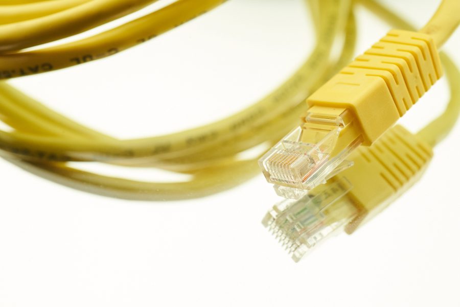 Network switch with patched fibre and copper cabling